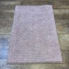 Tapis de bain rose clair