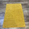 Tapis de bain jaune